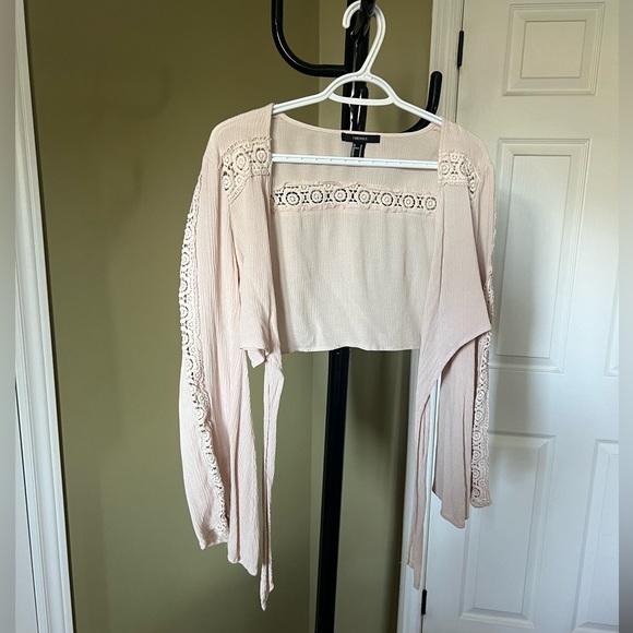 Beige detailed front tie up top. Flared long sleeves, size M from forever 21. - Picture 1 of 6